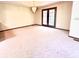 A bright dining room with french doors and a stylish chandelier at 116 Capt Anthony White Ln., Georgetown, SC 29440