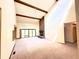 Bright living room with high vaulted ceiling and natural light entering through sliding glass door at 116 Capt Anthony White Ln., Georgetown, SC 29440