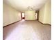 Large living room features neutral carpet and trim and multiple doorways for great flow and access at 116 Capt Anthony White Ln., Georgetown, SC 29440