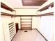 Spacious walk-in closet with shelving for organization and efficient storage solutions at 116 Capt Anthony White Ln., Georgetown, SC 29440