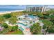 Resort-style swimming pool with lazy river, multiple sun loungers, and easy access to the ocean beach at 118 Goodson Loop, Pawleys Island, SC 29585