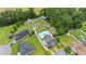 Aerial view showcasing a home with a private pool and RV parking area surrounded by lush greenery at 120 River Country Dr., Conway, SC 29526