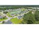 Beautiful aerial view of a residential neighborhood with a serene pond and well-maintained homes at 120 River Country Dr., Conway, SC 29526
