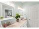 Bright bathroom featuring double sinks, granite countertop, and a decorative house plant at 120 River Country Dr., Conway, SC 29526