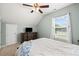 Cozy bedroom with neutral tones, ceiling fan, and a large window providing ample natural light at 120 River Country Dr., Conway, SC 29526