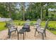 Inviting backyard fire pit area with comfortable seating, perfect for outdoor gatherings and relaxation at 120 River Country Dr., Conway, SC 29526