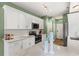 Bright kitchen featuring white cabinets, subway tile backsplash and stainless steel appliances at 120 River Country Dr., Conway, SC 29526