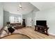 Comfortable living room with a ceiling fan, tile floor, and television at 120 River Country Dr., Conway, SC 29526
