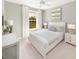 Cozy bedroom with neutral decor, comfortable bedding, and soft natural light streaming through the window at 1217 Lady Bird Way, North Myrtle Beach, SC 29582