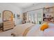 Comfortable bedroom with a window, built-in shelves, and space for relaxation and decor at 1415 Powhaton Dr., Myrtle Beach, SC 29577