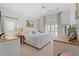 Tranquil main bedroom with vaulted ceiling and a large window allowing for plenty of natural light at 1415 Powhaton Dr., Myrtle Beach, SC 29577