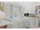 Bright main bedroom with vaulted ceilings, carpeted floors, and neutral walls at 1415 Powhaton Dr., Myrtle Beach, SC 29577