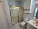 Bathroom with shower and glass doors, and vanity with a white cabinet at 1514 Lanterns Rest Dr. # 103, Myrtle Beach, SC 29579