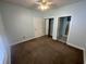 Well-lit bedroom featuring two doors and a ceiling fan at 1514 Lanterns Rest Dr. # 103, Myrtle Beach, SC 29579