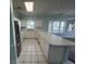 Functional kitchen with a breakfast bar and ample countertop space at 1514 Lanterns Rest Dr. # 103, Myrtle Beach, SC 29579
