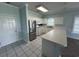Inviting kitchen with white cabinetry and stainless steel refrigerator at 1514 Lanterns Rest Dr. # 103, Myrtle Beach, SC 29579