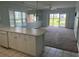 Open floor plan showcasing the kitchen and living areas with patio access at 1514 Lanterns Rest Dr. # 103, Myrtle Beach, SC 29579