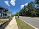 New quiet neighborhood street with homes nearby and trees in the background at 1627 Sayebrook Pkwy., Myrtle Beach, SC 29588