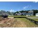 Street view of neighborhood with multiple houses in the distance at 1627 Sayebrook Pkwy., Myrtle Beach, SC 29588