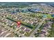 Aerial view showcasing the community layout, water features, clubhouse, and amenities at 1725 Boyne Dr., Myrtle Beach, SC 29588