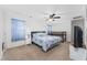 Large bedroom with queen bed, bunk bed, ceiling fan, and an airy and welcoming atmosphere at 1725 Boyne Dr., Myrtle Beach, SC 29588