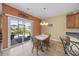 Dining area adjacent to sliding glass doors, providing an abundance of natural light at 1725 Boyne Dr., Myrtle Beach, SC 29588