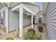 Charming front porch with tasteful landscaping provides a welcoming entrance to this lovely home at 1725 Boyne Dr., Myrtle Beach, SC 29588