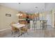 Open floor plan with kitchen, breakfast bar, dining, and lots of cabinet storage at 1725 Boyne Dr., Myrtle Beach, SC 29588