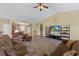 Bright open-concept living area with hardwood floors, neutral walls, and a seamless flow between rooms for comfortable living at 1725 Boyne Dr., Myrtle Beach, SC 29588