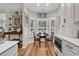 Cozy breakfast nook with bay window, table and chairs, and modern décor perfect for casual dining at 1788 Club Circle, Pawleys Island, SC 29585