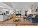 Open-concept living room with modern decor, featuring hardwood floors and plenty of natural light at 1788 Club Circle, Pawleys Island, SC 29585