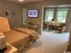 Serene bedroom with a view and access to seating area, offering relaxation and comfort at 18 Canvas Back Cove # 122, Georgetown, SC 29440