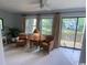 Inviting living room with comfortable seating and view to outdoor deck and pond at 18 Canvas Back Cove # 122, Georgetown, SC 29440