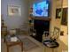 Cozy living room with a fireplace, a mounted TV and stylish decor at 18 Canvas Back Cove # 122, Georgetown, SC 29440