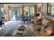 Sun-filled living area showcasing elegant seating and scenic outdoor views at 18 Canvas Back Cove # 122, Georgetown, SC 29440