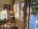 Bright office space with large windows offering a scenic view of the lake and beautiful surrounding landscape at 18 Canvas Back Cove # 122, Georgetown, SC 29440