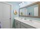 Bathroom featuring double sinks, a large mirror, and calming wall color at 1838 Zodiac Court, Myrtle Beach, SC 29577