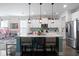 Modern kitchen with a large island, stainless steel appliances, and ample counter space at 1838 Zodiac Court, Myrtle Beach, SC 29577