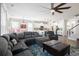 Open-concept living room flows into a modern kitchen, perfect for entertaining and Gathering gatherings at 1838 Zodiac Court, Myrtle Beach, SC 29577