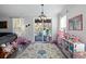 Spacious playroom with sliding glass doors leading to the backyard playset and natural light at 1838 Zodiac Court, Myrtle Beach, SC 29577