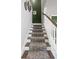 Elegant staircase features patterned carpet runner and classic white railings at 1838 Zodiac Court, Myrtle Beach, SC 29577