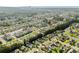Expansive aerial view of community featuring tranquil water, lush greenery, and inviting homes at 1931 Bent Grass Dr. # H, Surfside Beach, SC 29575