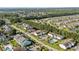 Beautiful aerial shot displaying tree-lined streets, tranquil water, and homes in the community at 1931 Bent Grass Dr. # H, Surfside Beach, SC 29575