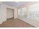 Inviting bedroom with large windows and ample closet space at 1931 Bent Grass Dr. # H, Surfside Beach, SC 29575