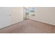 Bedroom with neutral walls and carpet and a window with natural light at 1931 Bent Grass Dr. # H, Surfside Beach, SC 29575