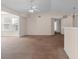 Spacious open-concept living area featuring neutral walls, carpet flooring, and ample natural light at 1931 Bent Grass Dr. # H, Surfside Beach, SC 29575