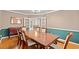Spacious dining room with a large table, seating for six, and french doors leading to the living room at 196 Weston Rd., Pawleys Island, SC 29585