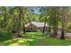 Home with lawn and mature shade trees at 196 Weston Rd., Pawleys Island, SC 29585