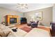 Comfortable living room with a fireplace and a cozy couch at 196 Weston Rd., Pawleys Island, SC 29585