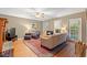 Living room with hardwood flooring, fireplace, and view of stairs at 196 Weston Rd., Pawleys Island, SC 29585